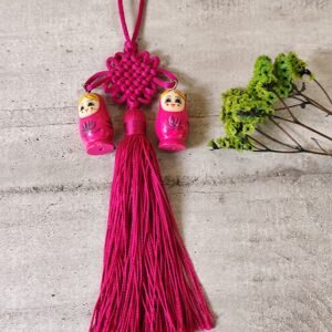 Noeud chinois avec poupées russes.